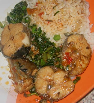 Rice with vegetable sauce and fish